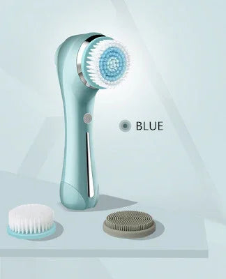 Blue electric facial cleansing brush with two interchangeable brush heads on a light background.